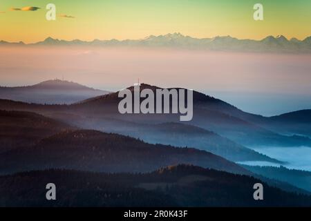 View from the Belchen south on the Wiesental valley and the Swiss Alps, morning atmosphere with fog, autumn, Black Forest, Baden-Wuerttemberg, Germany Stock Photo