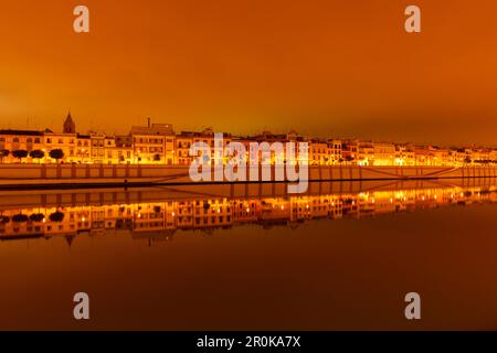 Barrio de Triana in the evening with reflection, Triana quarter, Rio Guadalquivir, river, Calle Betis, Seville, Andalucia, Spain, Europe Stock Photo