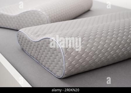 Orthopedic foam pillow with memory effect. Comfortable sleep and healthy spine. Stock Photo
