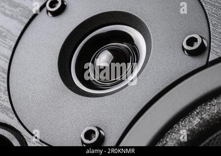 Black high frequency tweeter speaker close-up macro shot. Stock Photo