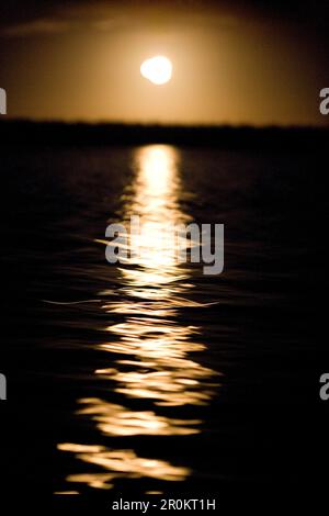 MEXICO, Baja, Magdalena Bay, Pacific Ocean, the moon refelecting on Magdalena Bay Stock Photo