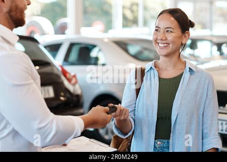 Car Salesman Giving Keys to Client Stock Photo - Alamy