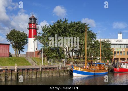Harbour and lighthouse in Büsum, Dithmarschen, Schleswig-Holstein, Northern Germany, Germany, Europe Stock Photo