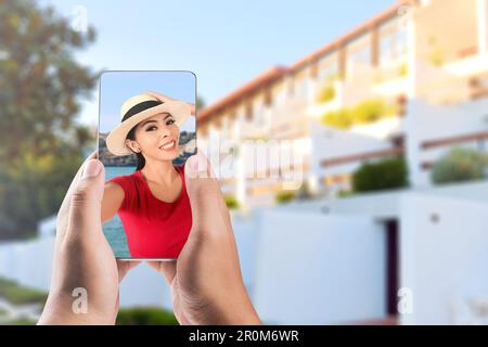 Asian woman looking at social media on his mobile phone. Social media day concept Stock Photo