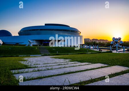 Sunset at the Shanghai Astronomy Museum in Lingang, Pudong New Area, Shanghai, China. Stock Photo