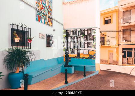 Calpe, Spain - April 14, 2023: View to cozzy empty street with colorful houses in historic center Calpe old town. Calpe, Alicante province, Valencian Stock Photo