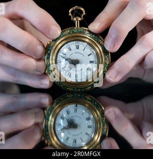 Bonhams, London, UK. 9th May, 2023. Watches & Wristwatches including timepieces from the T P Camerer Cuss Collection auction takes place on 11 May at Bonhams Knightsbridge. Highlights include: Jan Berninck, Amsterdam. 18K gold key wind triple case pocket watch, c. 1740. Estimate £8,000-12,000. Credit: Malcolm Park/Alamy Live News Stock Photo