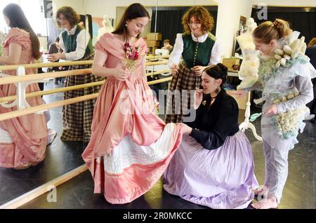 PRODUCTION - 06 May 2023, Saxony, Schkeuditz Hayna: For their new musical 'Journey to the Center of the Earth' after Jules Verne, Therese Stadler, Lisa Kruber, Iris Zwiener and Brit von Ryssel (l-r) of the Musiktheaterverein try on their costumes. The musical will have its premiere in the summer (05.08.23) on the occasion of the 25th anniversary of the music theater association on the by then newly designed stage at Schladitzer See in Hayna as part of the Biedermeier Culture Festival. By the summer, the largest roofed lake stage in Germany for around 1000 spectators and a Biedermeier village Stock Photo