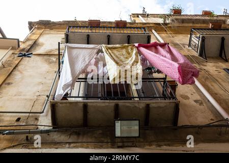 Typical sight when looking at the balconies in Palermo: clothesline Stock Photo