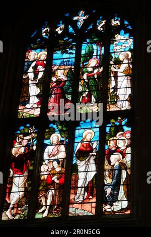 St Peter and St Paul church, Lady Chapel south east window depicting the risen Christ and  John the Baptist.  Lavenham Suffolk UK. April 2023 Stock Photo