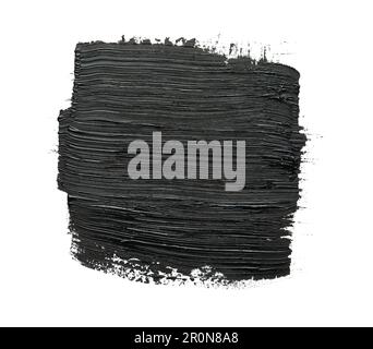 Brushstrokes of black oil paint on white background, top view Stock Photo