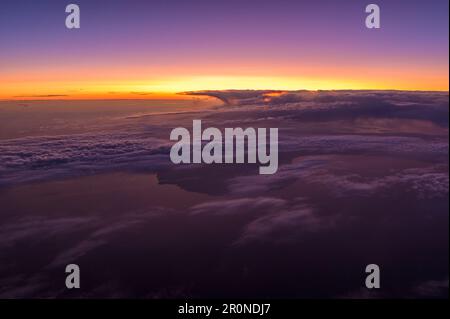 Colorful sunset over the clouds, Denmark Stock Photo