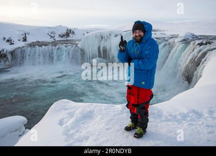 Winter kayaking on Godafoss in northern Iceland Stock Photo