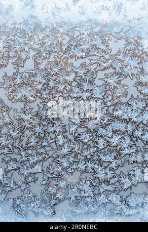 ice crystals on home window glass on cold winter day Stock Photo
