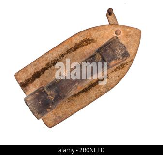 top view of old charcoal iron cut out on white background Stock Photo