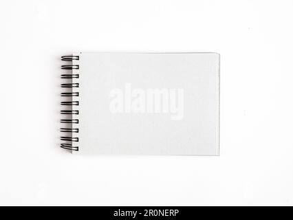 Spiral bound notepad, blank page of notebook, paper of sketchbook. Stock Photo