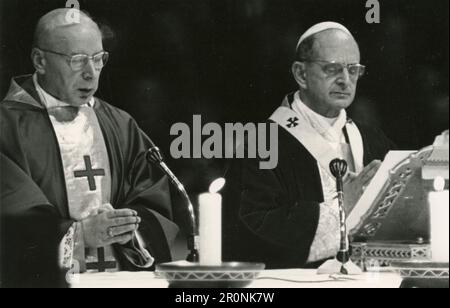 Pope Paul VI celebrating mass with another top priest, Vatican City 1965 Stock Photo