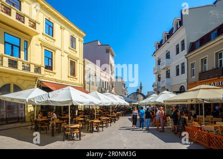 Restaurants in the Strada Mircea cel Bătrân in the old town of Constanta, Dobruja, Black Sea coast, Romania Stock Photo