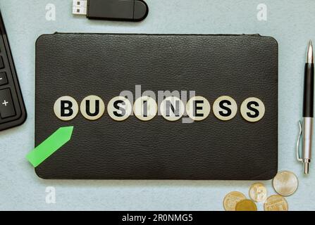 Business word from wooden blocks on desk. Stock Photo