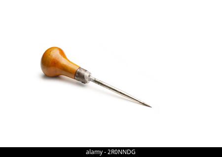 An awl with wooden handle on a white background with copy space Stock Photo
