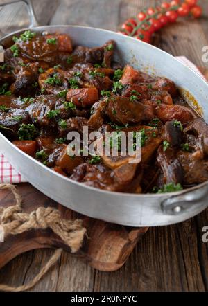 Holiday or sunday meat dish with braised beef shanks or leg slices with gravy Stock Photo