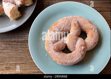 Pretzel Doughnut with sugar topping Stock Photo