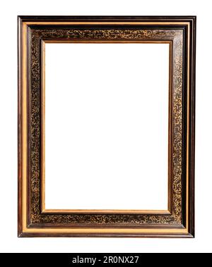 old vertical ornamental wooden picture frame isolated on white background with cut out canvas Stock Photo