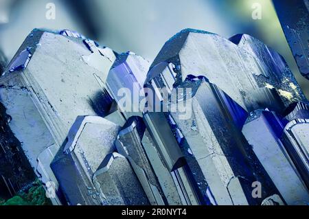 Blue azurite crystal on malachite matrix. macro detail texture background. close-up raw rough unpolished semi-precious gemstone Stock Photo