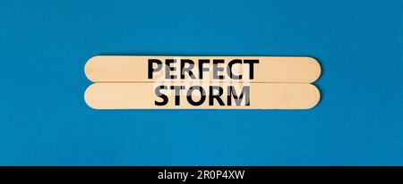 Perfect storm symbol. Concept words Perfect storm on beautiful wooden stick. Beautiful blue table blue background. Business and Perfect storm concept. Stock Photo