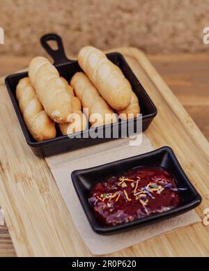 Serving of sticks stuffed with cheese called tequeños Stock Photo