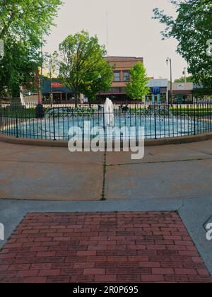 Paola, Kansas - May 8, 2023: Fountain and Gazebo at Paola City Park Square in Miami County KS Stock Photo