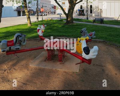 Paola, Kansas - May 8, 2023: Old Playground Equipment at Paola City Park Square Stock Photo