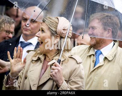 Wadden Islands, Netherlands. 09th May, 2023. WEST-TERSCHELLING - King Willem-Alexander and Queen Maxima on the square in front of the Brandaris lighthouse. The royal couple will pay a two-day regional visit to the Wadden Islands. ANP KOEN VAN WEEL netherlands out - belgium out Credit: ANP/Alamy Live News Stock Photo