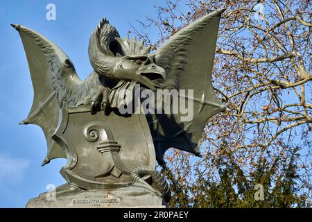 Bridge keeper basilisk (dragon with wings and Basel coat of arms) at the Basel Wettstein Bridge in the city of Basel in the canton of Baselstadt (BS) Stock Photo