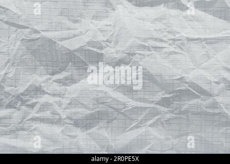 Texture of crumpled white paper. Background from paper with wrinkles and folds Stock Photo