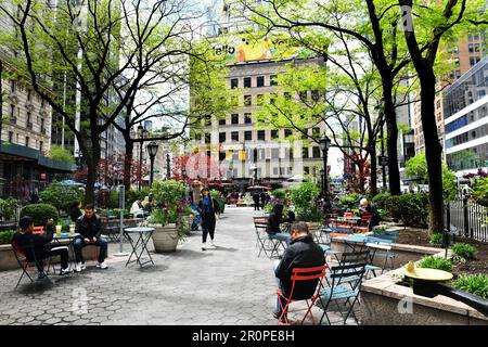 NYC Herald Square Midtown with Greeley Square Park chairs tables - New York City - USA Stock Photo