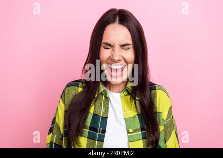 Photo of angry shocked lady wear checkered jacket shouting closed eyes isolated pink color background Stock Photo