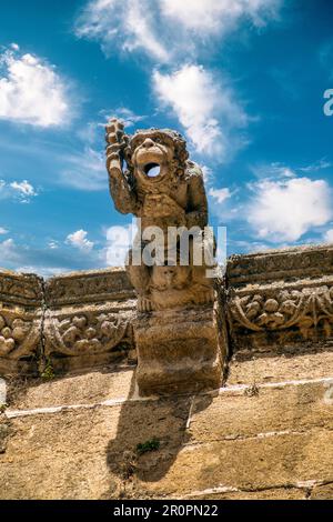 Grotesque stone gargoyle on the roof of the cathedral of Plasencia, in Cceres, Spain Stock Photo