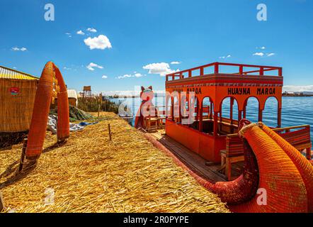 Uros, Peru - October 04, 2021. The floating islands of the Uros on the Lake Titicaca, are made entirely from totora reeds, located at 3 815 meters abo Stock Photo