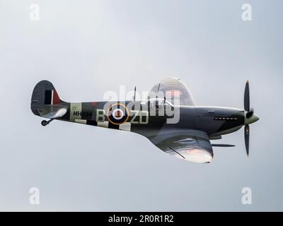 Spitfire MH434 flying over Biggin Hill airfield Stock Photo