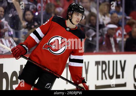 New Jersey Devils center Jack Hughes skates the ice during the first period  of an NHL hockey game against the Nashville Predators, Friday, Dec. 10,  2021, in Newark, N.J. (AP Photo/John Minchillo