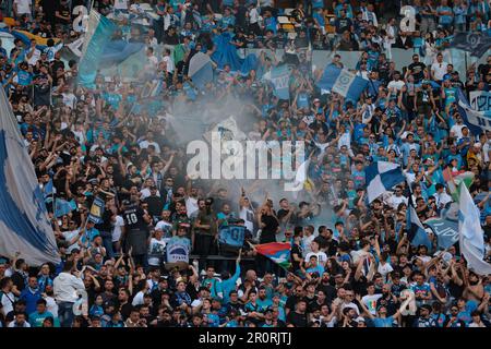 Naples, Italy, 7th May 2023. SSC Napoli fans wave flags and let off smoke bombs as they begin to party during the Serie A match at Stadio Diego Armando Maradona, Naples. Picture credit should read: Jonathan Moscrop/ Sportimage Stock Photo
