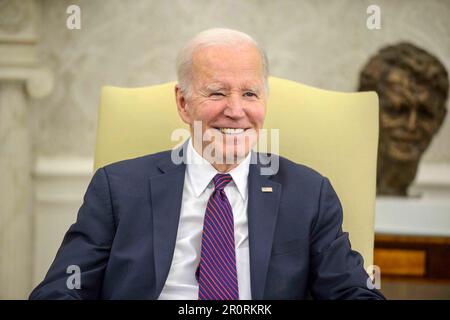 Washington DC, USA. 09th May, 2023. United States President Joe Biden smiles while speaking as he is joined by Speaker of the US House of Representatives Kevin McCarthy (Republican of California), US House Minority Leader Hakeem Jeffries (Democrat of New York), US Senate Majority Leader Chuck Schumer (Democrat of New York), and US Senate Minority Leader Mitch McConnell (Republican of Kentucky), to discuss the debt limit at the White House in Washington, DC on Tuesday, May 9, 2023. Credit: MediaPunch Inc/Alamy Live News Stock Photo