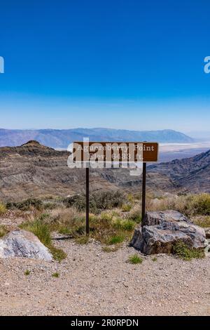 Elevation sign at Aguereberry Point, 6433 feet (1960.8 meters) elevation, looking out at Death Valley which is said to be the hottest place on earth. Stock Photo
