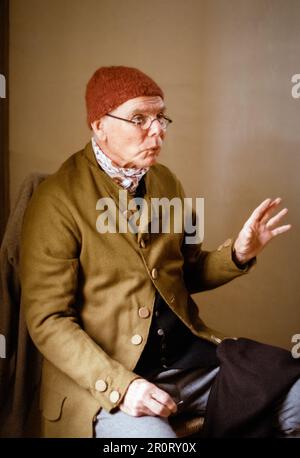 Concord, Massachusetts USA - April 2023 - A man dressed in colonial period clothing with a red knit hat describes the historical events that occurred Stock Photo