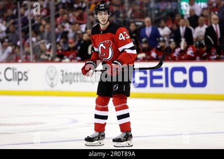 New Jersey Devils center Jack Hughes skates the ice during the first period  of an NHL hockey game against the Nashville Predators, Friday, Dec. 10,  2021, in Newark, N.J. (AP Photo/John Minchillo