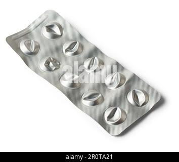 close-up of used empty pill blister pack, discarded silver medicine packs made of plastic and aluminum foil and not biodegradable, isolated on white Stock Photo