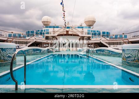 Yokohama, Japan  July 16, 2016 - Empty blue pool on the Princess Cruise Line's Diamond Princess. Stock Photo