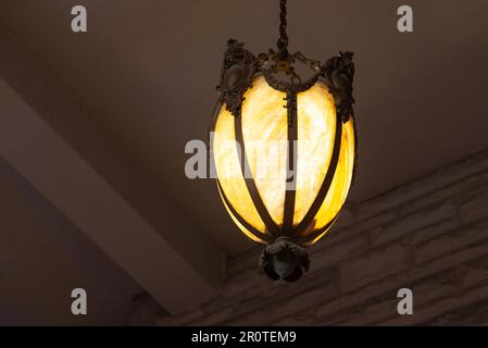 Toronto, ON, Canada - December 20, 2022: Retro chandelier in Casa Loma castle in Toronto. The place is part of the Canadian National Heritage and a to Stock Photo