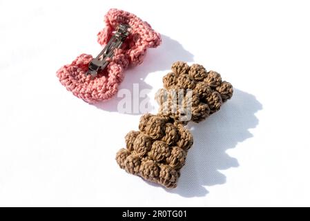 Hair clips woven in crochet and of various colors Stock Photo - Alamy